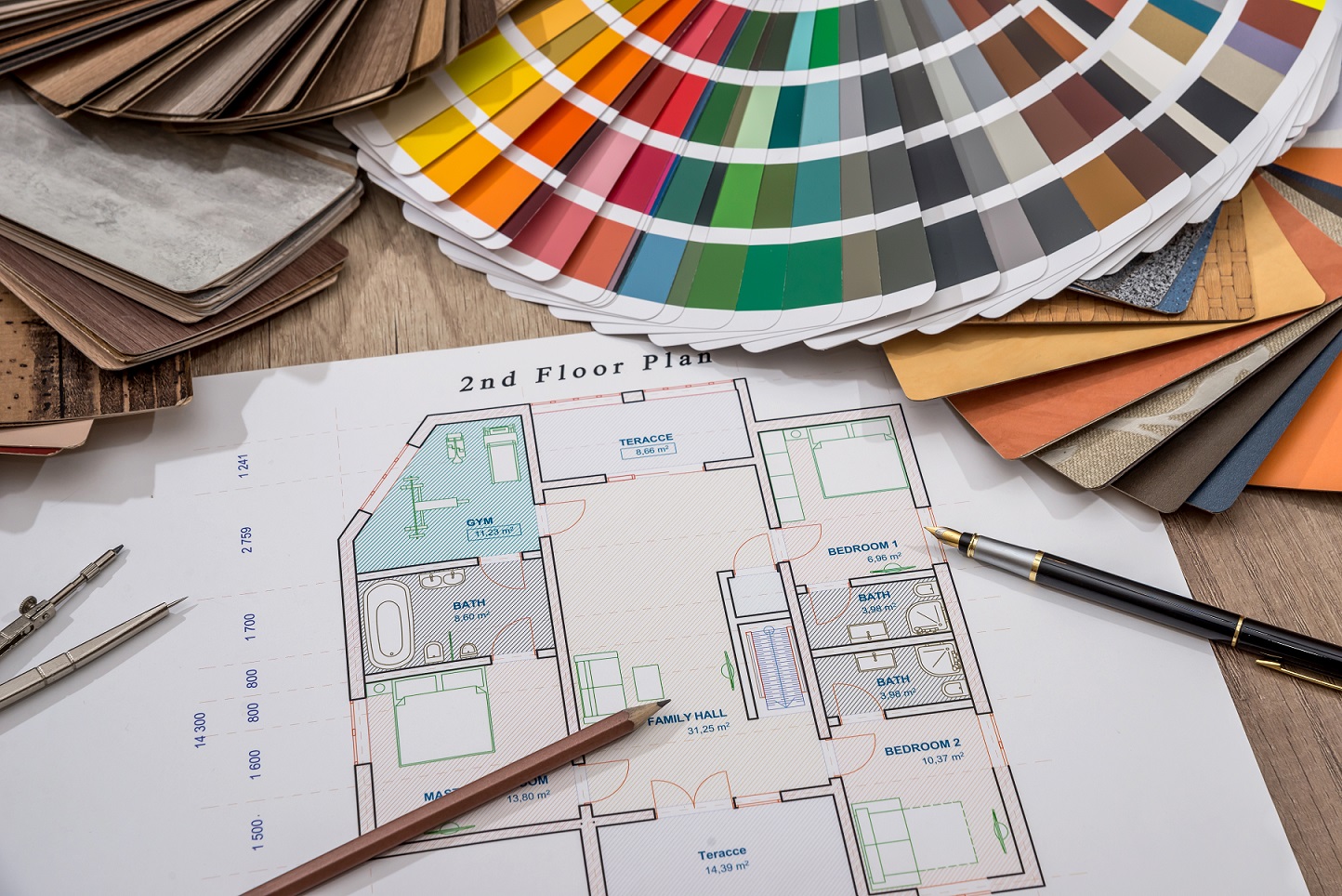 architectural drawings with palette of colors and wooden sampler for furniture designs for interior works.